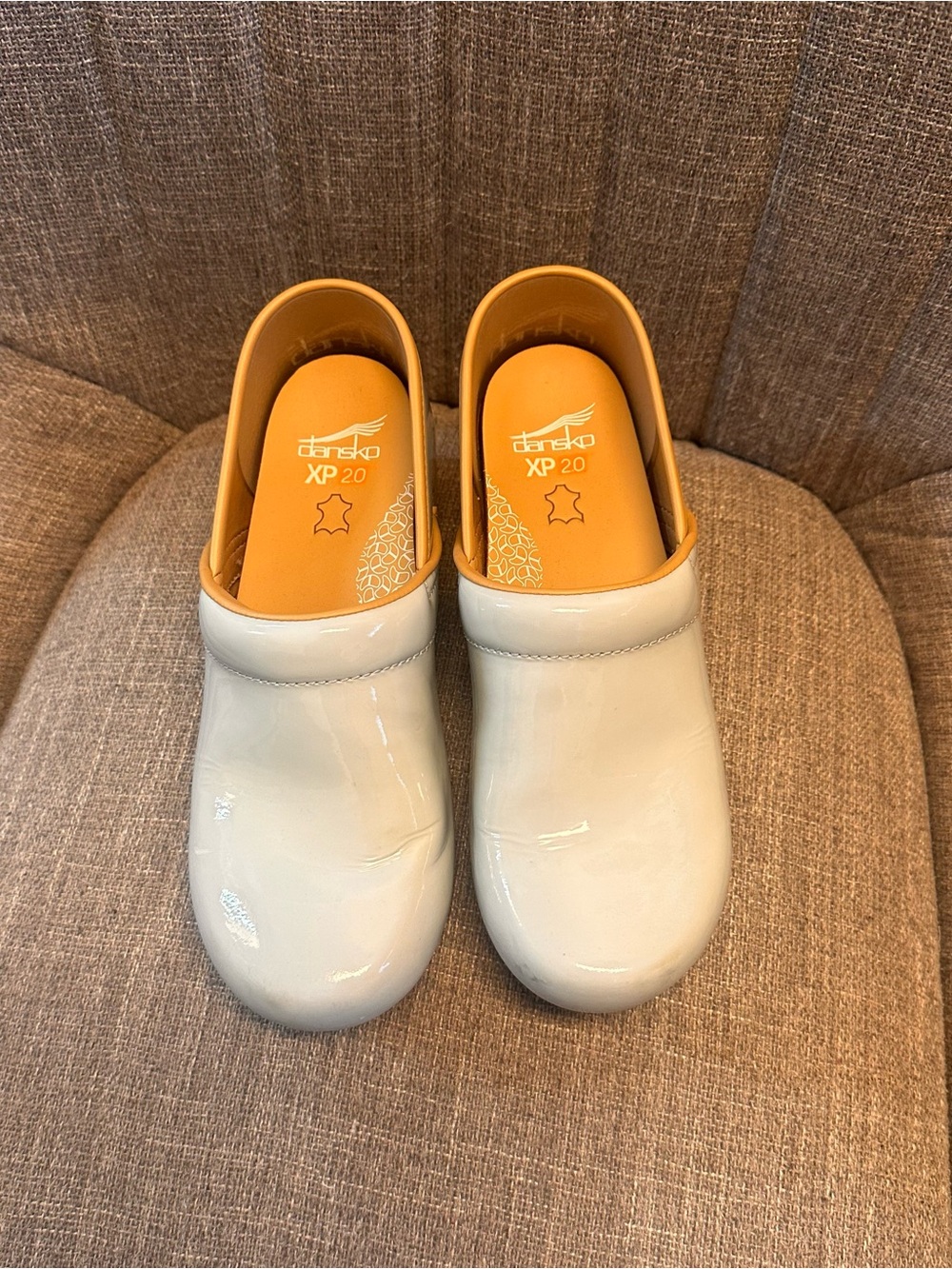 Dansko Patent White Leather Clogs with Orange Insoles